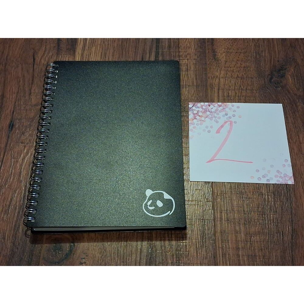 Unused Panda Planner Weekly 2.0 in Black - Plastic Cover Spiral Daily Planner